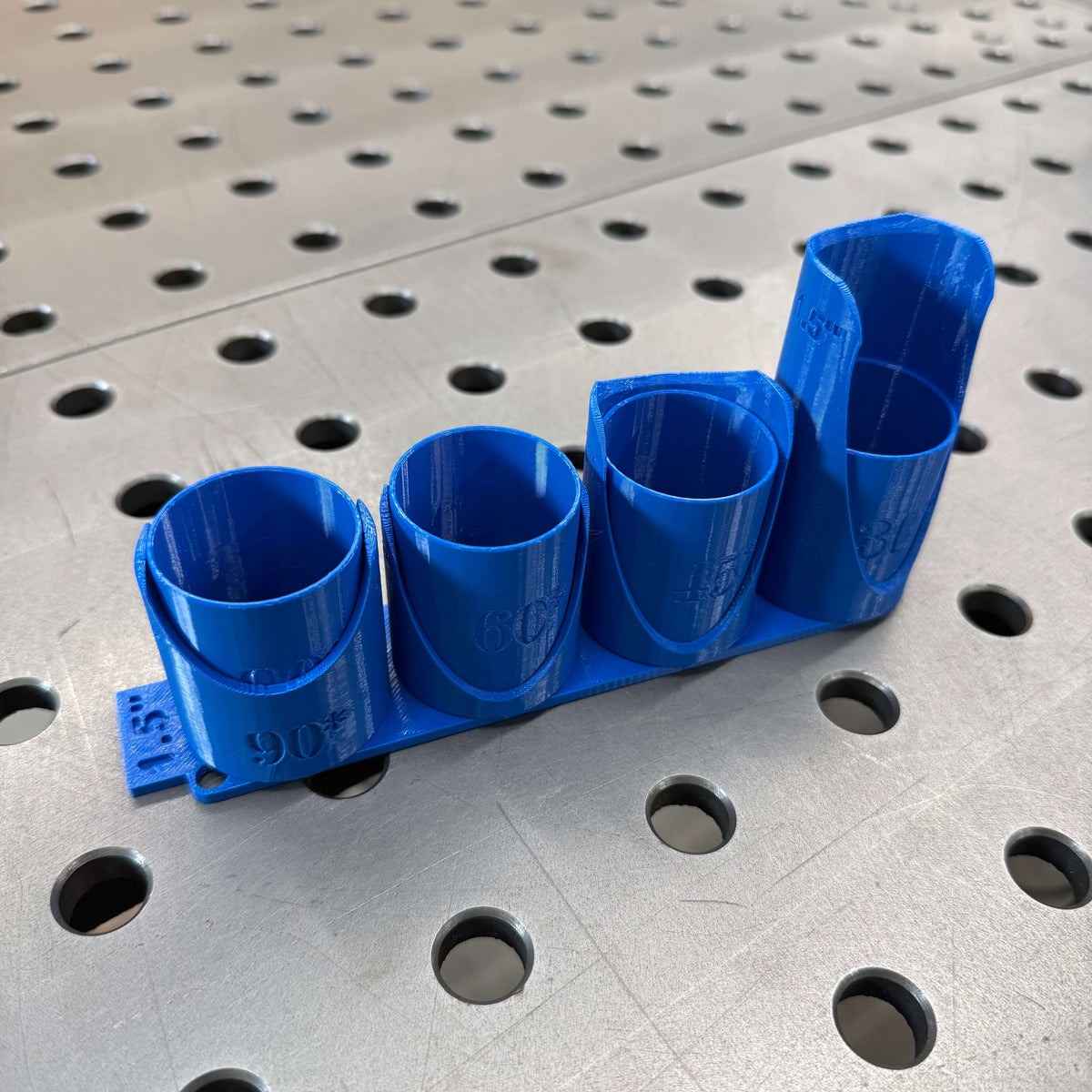 Single size tube notching templates in blue angled